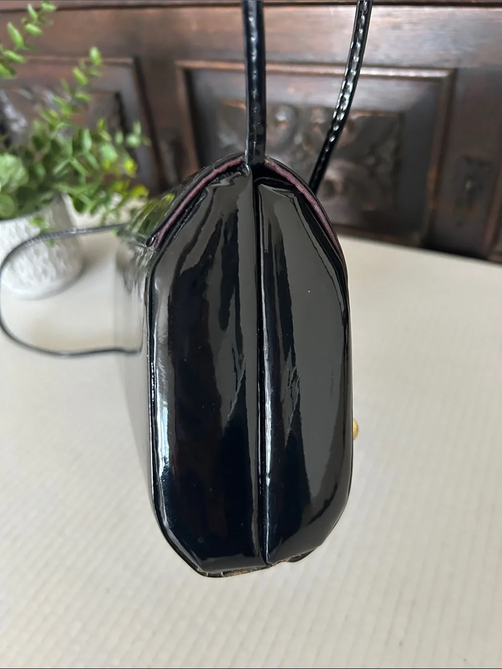 Ande Sleek Black Patent Crossbody with Gold Accent